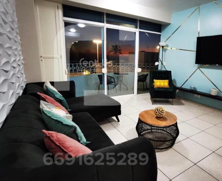 Condominio Miramar, Mazatlan en malecón frente a la playa Exterior foto